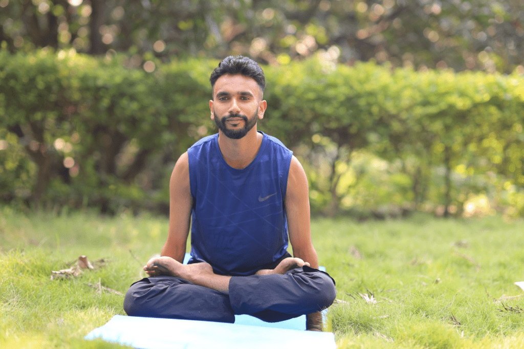 boy perfoming yoga